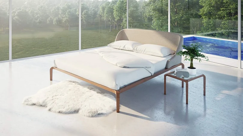 une image d'un beau lit avec des draps en tissu de bambou