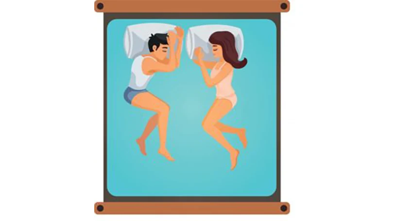position de sommeil des couples sur l'oreiller