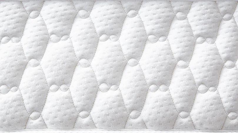 une image d'une surface lisse d'un matelas recouvert de gel
