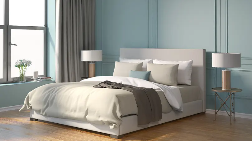 Image d'un nouveau lit à l'intérieur d'une chambre à coucher