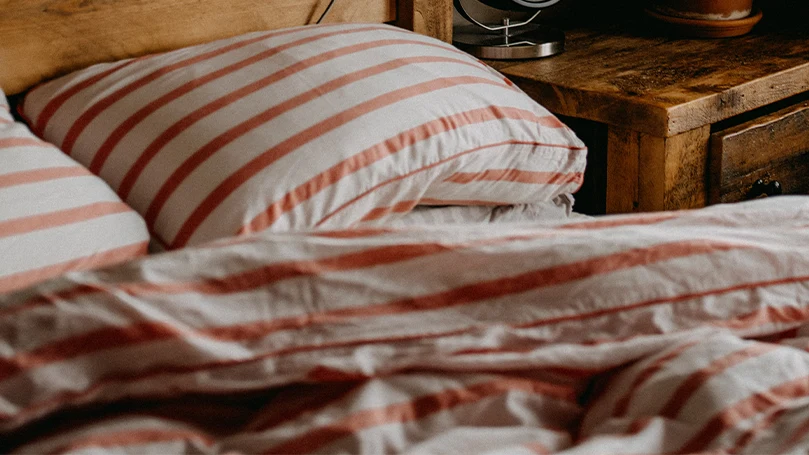 Image d'un oreiller et d'une couette dans une housse de couette