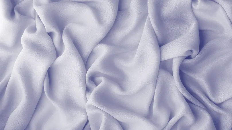 Une image de draps de soie froissés